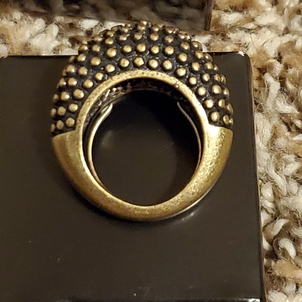 Mark. show your metal ring
